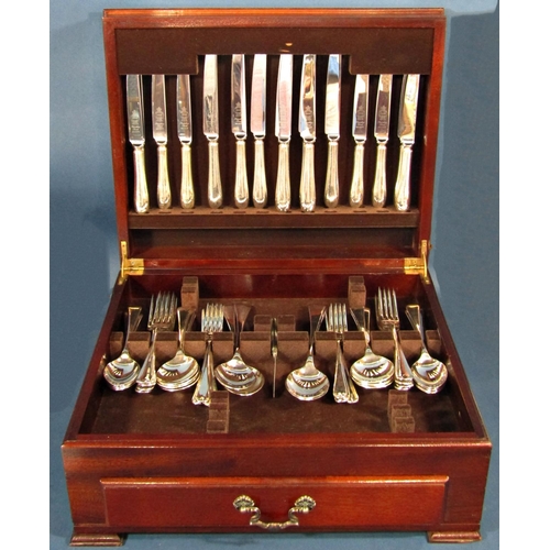 1202 - A canteen of silver plated fiddle pattern cutlery for eight settings, spread over two levels, and a ... 