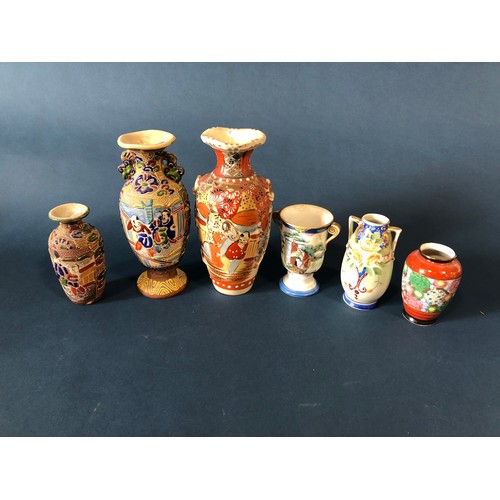 1058A - Sixteen pieces of Japanese ceramic items including: satsuma ware vases, pots and a hexagonal box and... 