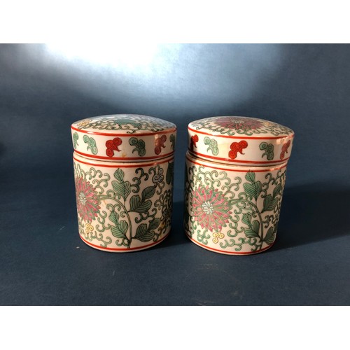 1058 - Pair of Chinese doucai cylindrical boxes with covers, height approx. 16 cm each (2)