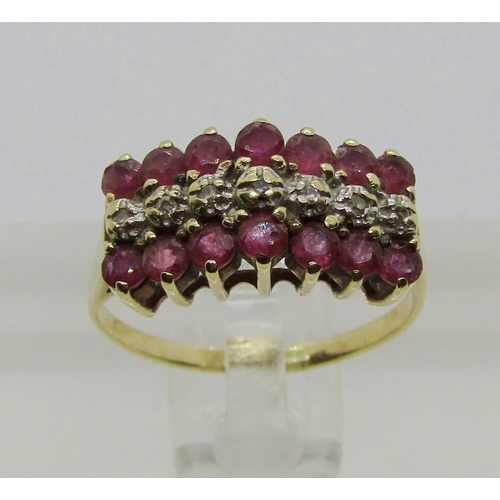 1371 - Yellow metal triple row ruby and diamond ring, size J, 2.2g