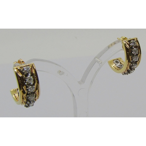 1374 - Pair of yellow metal diamond half hoop earrings, each set with nine 0.05ct diamonds, 9.7g