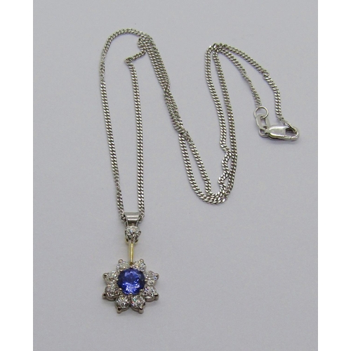 1376 - Tanzanite and diamond cluster pendant in bi-colour metal, bale diamond 0.10ct approx, pendant 2.4cm ... 