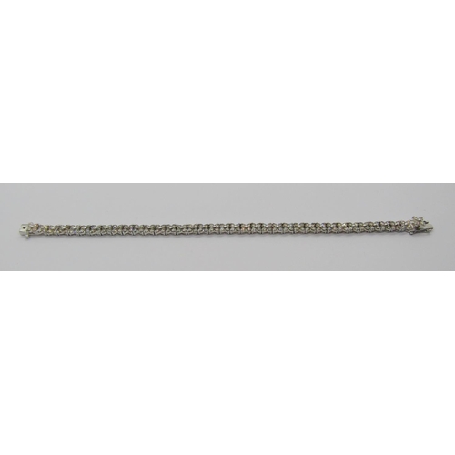 1388 - 18k white gold diamond line bracelet, 5ct total approx, 17.3cm L approx, 13.3g