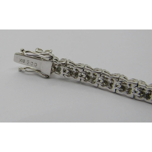 1388 - 18k white gold diamond line bracelet, 5ct total approx, 17.3cm L approx, 13.3g