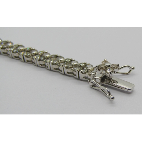 1388 - 18k white gold diamond line bracelet, 5ct total approx, 17.3cm L approx, 13.3g