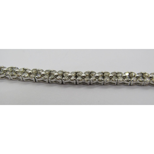 1388 - 18k white gold diamond line bracelet, 5ct total approx, 17.3cm L approx, 13.3g