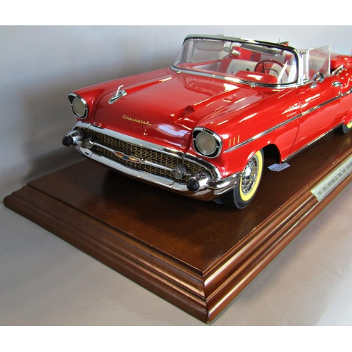 1655 - A 1:12 scale model of a 1957 Chevrolet Belair Convertible serial number 3946, in red with chrome fin... 