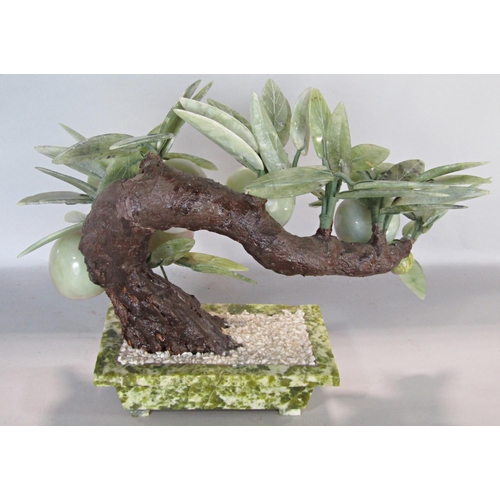 1612 - A Chinese soapstone model of a fruiting tree in a square cut pot
