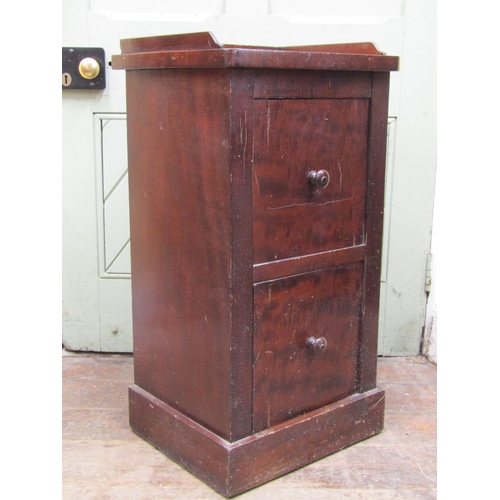 2567 - Mid-19th century mahogany side cupboard enclosed by two doors set beneath a three quarter gallery on... 