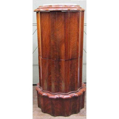 2584 - A good quality Victorian mahogany cylindrical commode with fluted outline, rising lid and opening ar... 