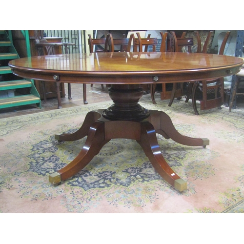 2586 - High quality Regency style extending dining table of circular form together with a set of twelve sab... 