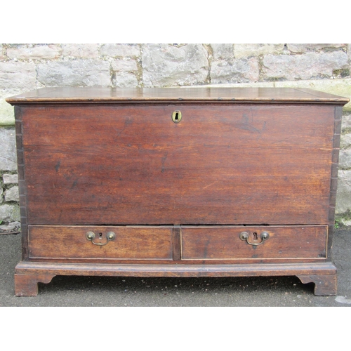 2603 - A Georgian oak mule chest with rising lid over two frieze drawers raised on bracket supports, 103cm ... 