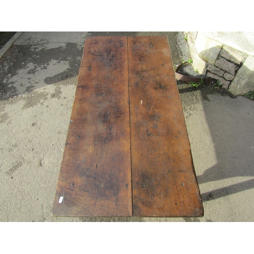 2604 - An antique rectangular occasional table with plank top enclosing a single frieze drawer on square cu... 