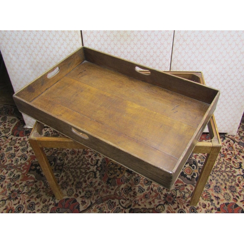 2609 - A Georgian oak rectangular butlers tray, set on a later framework