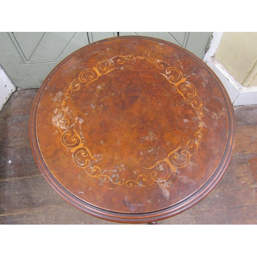 2611 - A Victorian walnut and figured walnut occasional table, the circular top with simple scrolling marqu... 