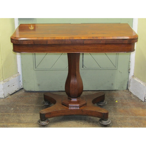 2618 - A late Regency rosewood D end fold over top card table with vase shaped pillar and platform base