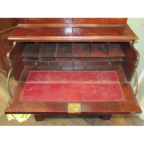 2624 - A small Georgian mahogany secretaire bookcase, the lower section with six drawers, the upper two sec... 