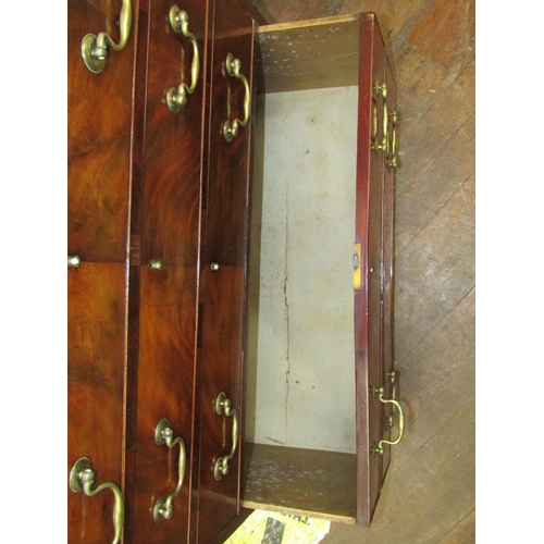 2624 - A small Georgian mahogany secretaire bookcase, the lower section with six drawers, the upper two sec... 