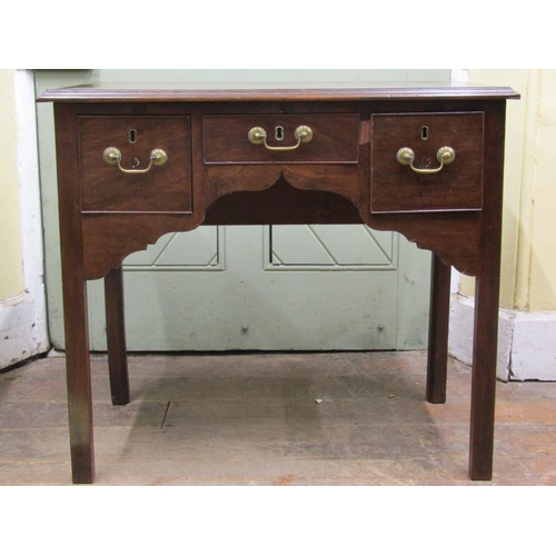 2633 - 19th century mahogany low boy fitted with three drawers to a central shaped apron and square moulded... 