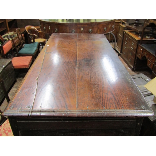 2650 - 18th century oak coffer with panelled frame, the front with repeating geometric detail, 132cm wide