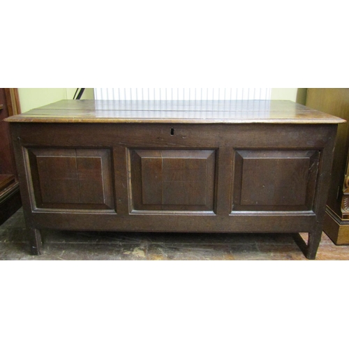 2662 - 18th century oak panelled coffer with fielded panels to front and sides beneath a plank top, 130cm w... 