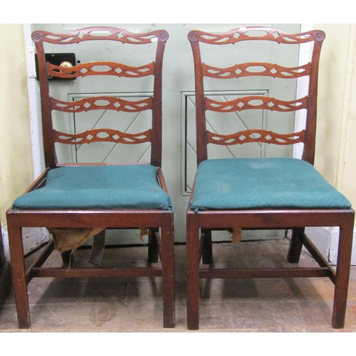 2667 - A pair of Georgian mahogany ladderback dining chairs, the rails with carved and pierced detail with ... 