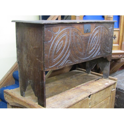 2673 - 18th century oak six plank coffer with geometric carved detail and central steel lock plate, 110cm l... 