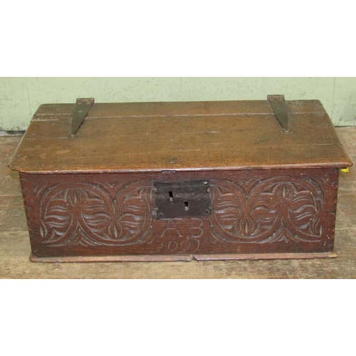 2674 - Late 17th century oak bible box with rising lid, the front elevation with geometric carved detail mo... 