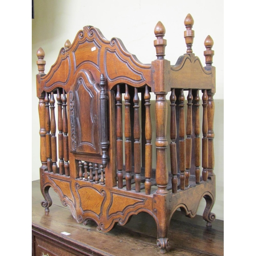 2678 - A late 18th century walnut food or dole cupboard, the central door with sturdy hinge and lock plate,... 