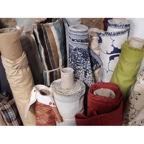 1512 - Large quantity of good quality part rolls of  dress and upholstery fabrics, and linings including a ... 