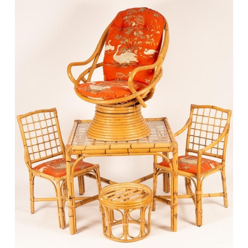 2509 - A suite of cane furniture comprising a table, pair of chairs, a revolving cane chair with matching u... 