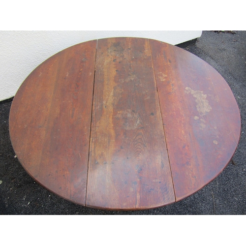 2517 - An 18th century oak gateleg table with well turned legs and supports, 100 cm in length