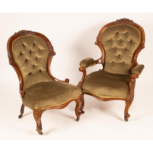 2547 - A pair of Victorian walnut lady and gentleman's chairs with carved frames on cabriole legs