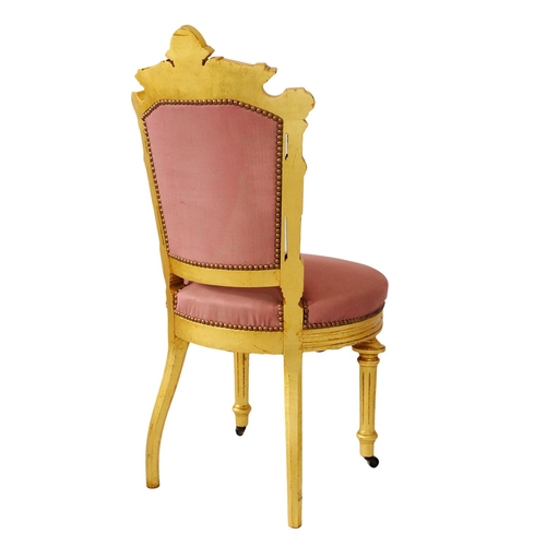 2574 - A pair of 19th century French side or salon chairs with shaped and gilded frames, upholstered seats ... 