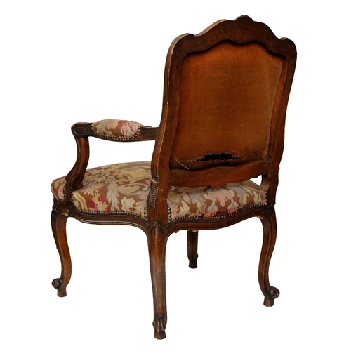 2591 - 19th century French open armchair with carved and moulded framework in beech, with gross and petit p... 