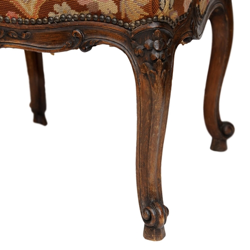 2591 - 19th century French open armchair with carved and moulded framework in beech, with gross and petit p... 