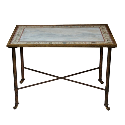 2610 - A Regency style brass occasional table raised on four turned supports supported by an X shaped stret... 