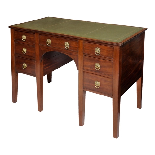 2617 - A small Edwardian mahogany ladies writing desk with central kneehole flanked by seven drawers on squ... 