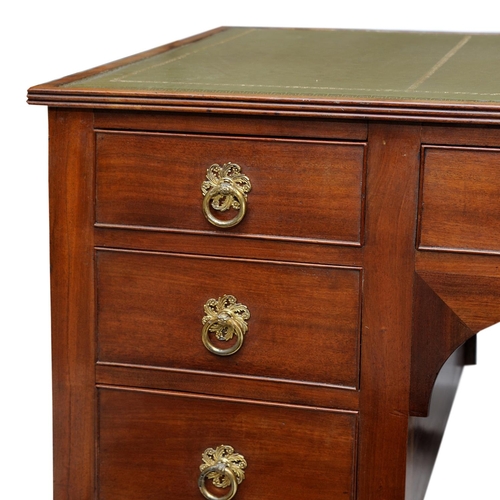 2617 - A small Edwardian mahogany ladies writing desk with central kneehole flanked by seven drawers on squ... 