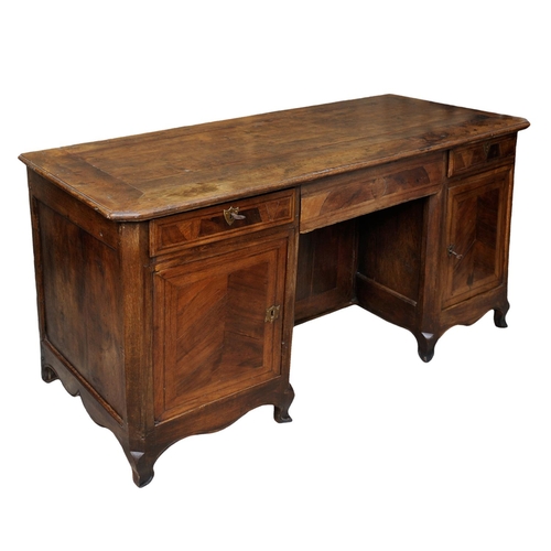 2622 - 19th century French provincial walnut kneehole writing desk fitted with three cupboards and three dr... 