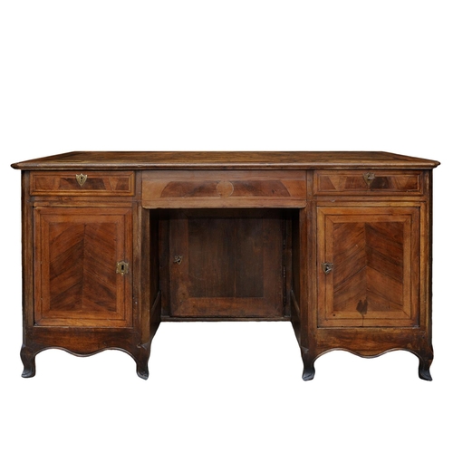 2622 - 19th century French provincial walnut kneehole writing desk fitted with three cupboards and three dr... 