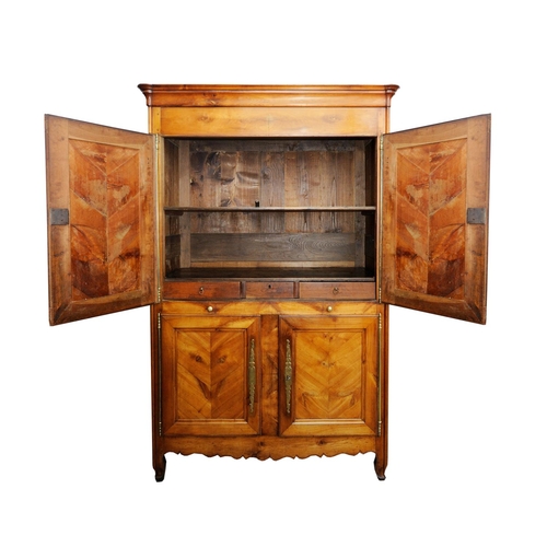 2623 - 18th century cherry wood armoire, the front enclosed by two pairs of panelled doors within a panelle... 