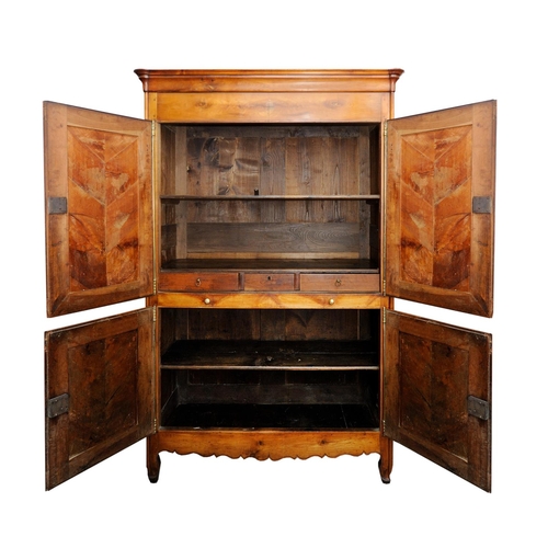 2623 - 18th century cherry wood armoire, the front enclosed by two pairs of panelled doors within a panelle... 