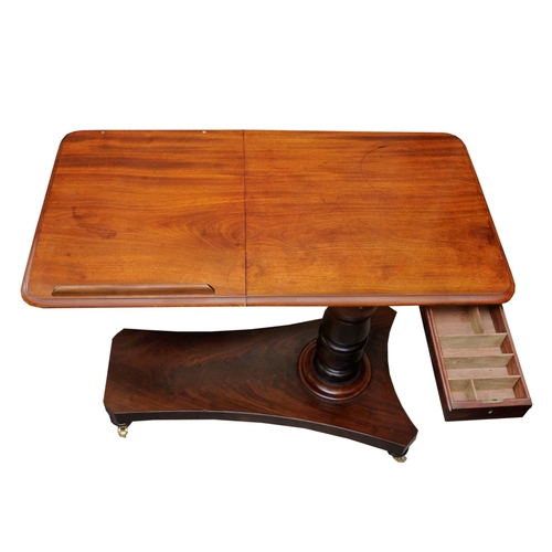 2635 - A Regency mahogany cantilever reading/writing table raised on a turned adjustable column, the top wi... 