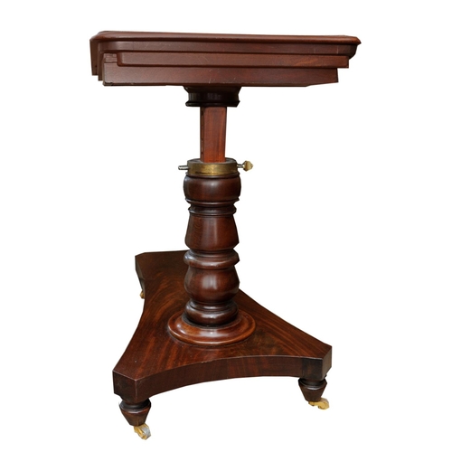 2635 - A Regency mahogany cantilever reading/writing table raised on a turned adjustable column, the top wi... 