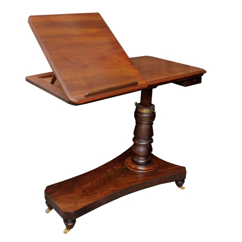 2635 - A Regency mahogany cantilever reading/writing table raised on a turned adjustable column, the top wi... 