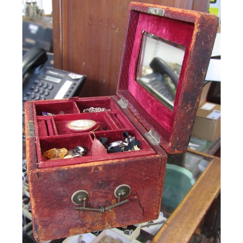 1418 - Antique red Morocco leather jewellery box containing a selection of costume jewellery to include an ... 