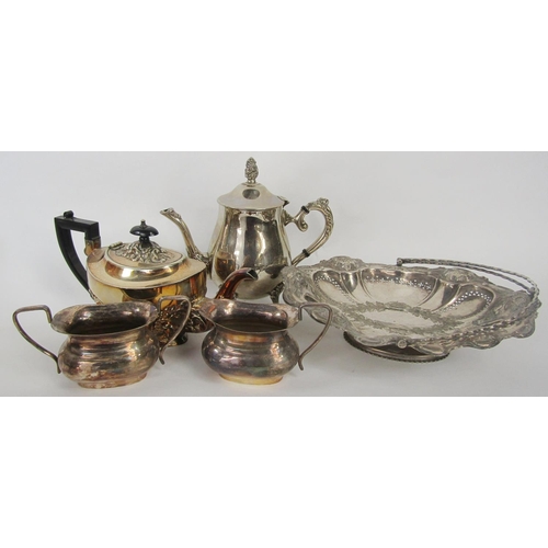 1191 - A selection of silver plated items including a meat cover, a circular tray, tea and coffee pots, toa... 