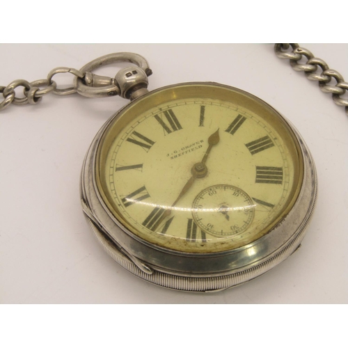 1441 - A heavy silver pocket watch and silver watch chain