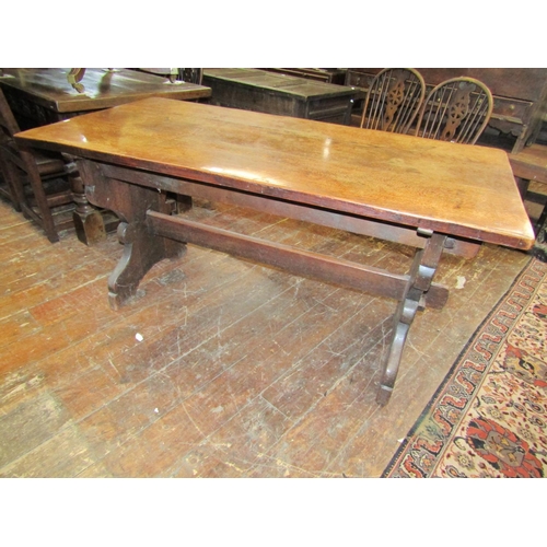 2651 - 19th century oak refectory table, the plank top raised on shaped supports with pegged frame, united ... 